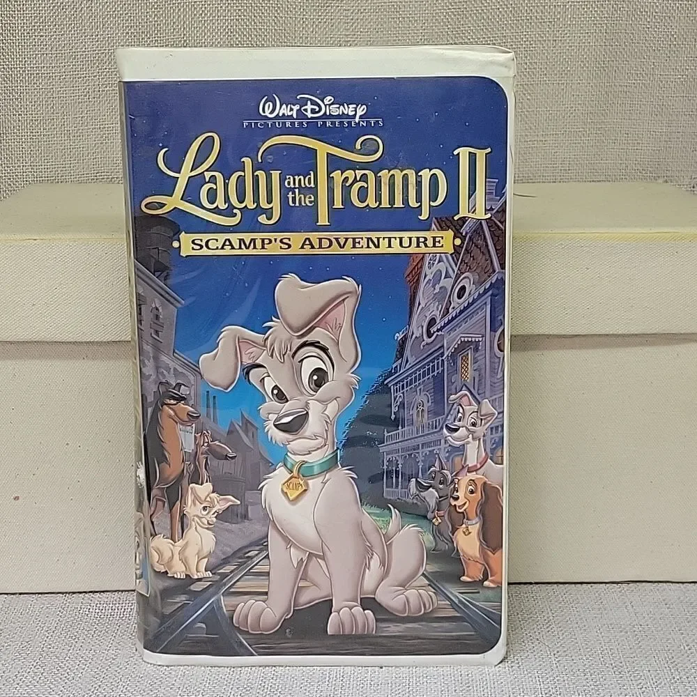 Disney's Lady and The Tramp II‎ vhs, books and Tramp plush